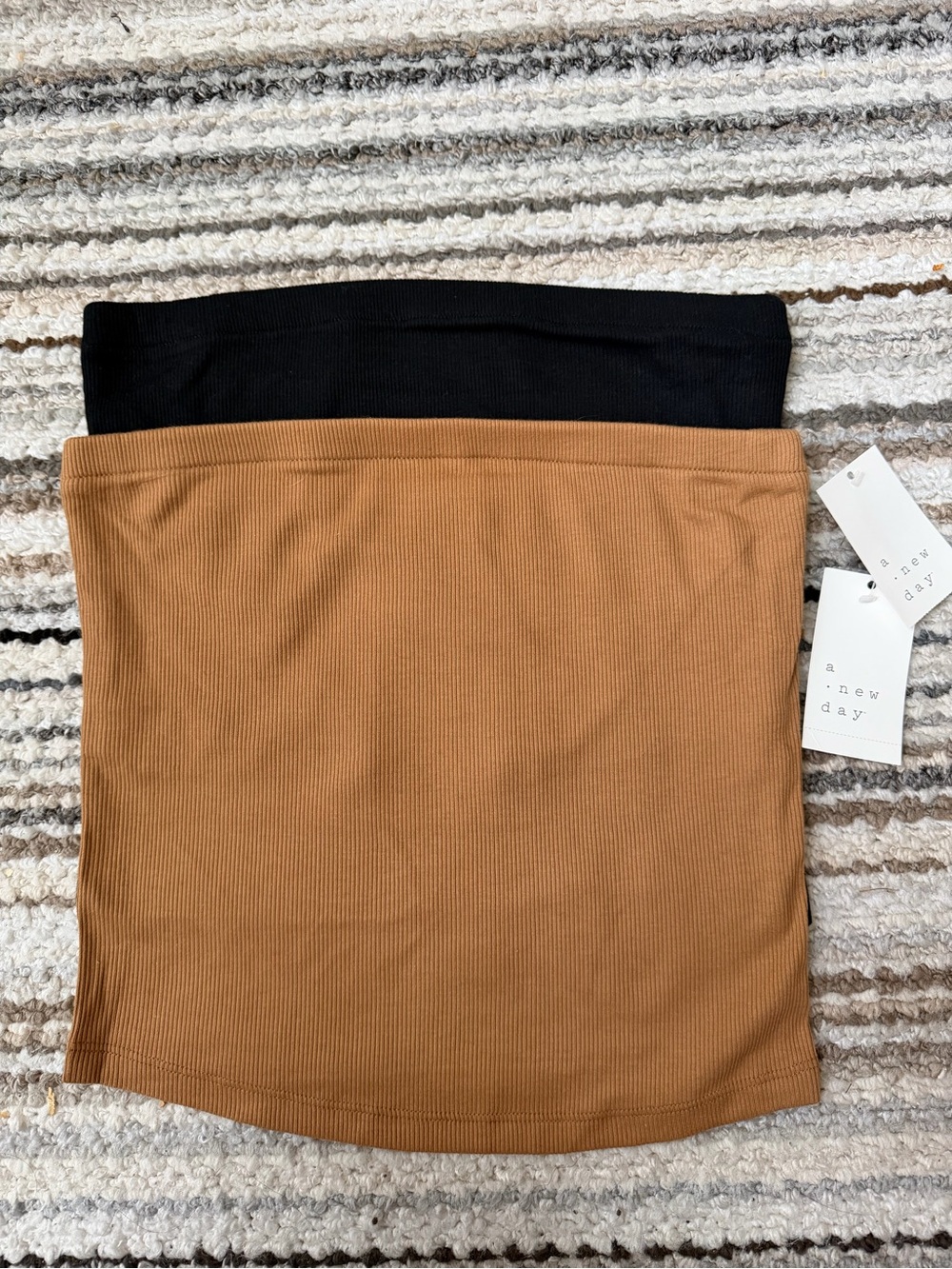 Two tops one black one camel